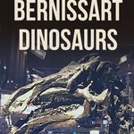 Pin with text, "The Bernissart Dinosaurs" and a photo of the head of one of the Iguanodons found in Bernissart and housed in the cage at the Belgian Museum of Natural Sciences.