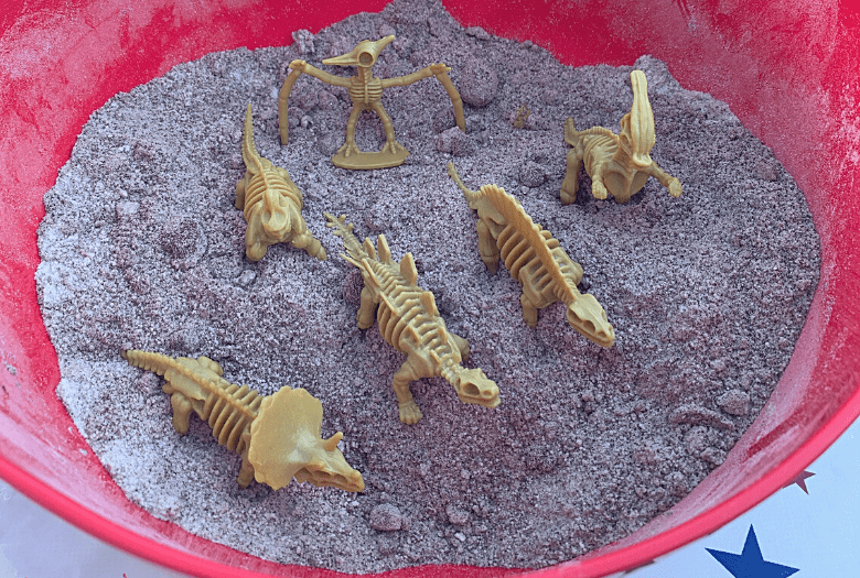 Step 1: Pour all the dry ingredients into the bowl and mix to combine. The dinosaurs do not need to be in the bowl!